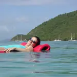 <strong>A swim vacationer relaxes near the British Virgin Islands.</strong><br><br><em>Photo Courtesy of SwimVacation</em>
