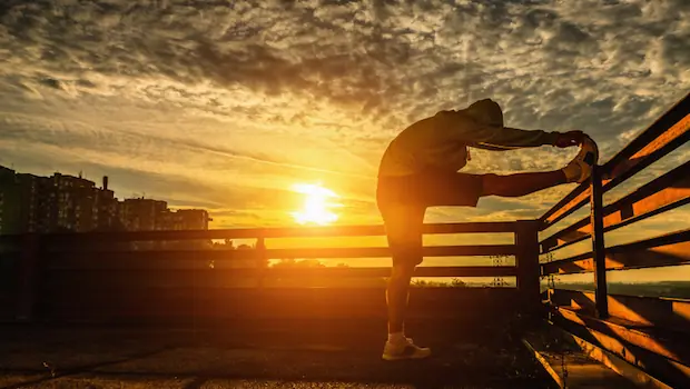 A man stretching before exercising.