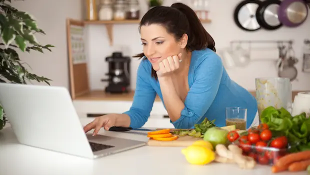 A woman on a computer.